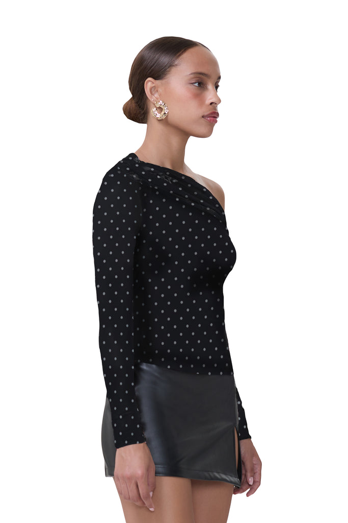 women's off the shoulder long sleeve top with asymmetrical neckline in noir dot print