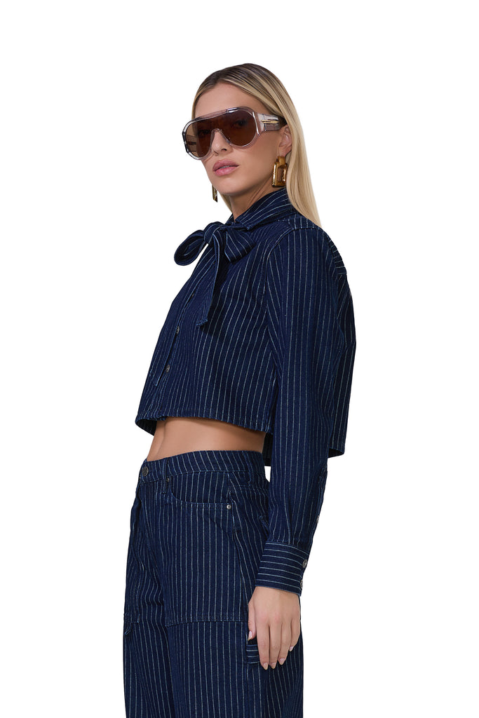 women's long sleeve cropped pin stripe shirt with an adjustable self tie neck tie in dark wash 