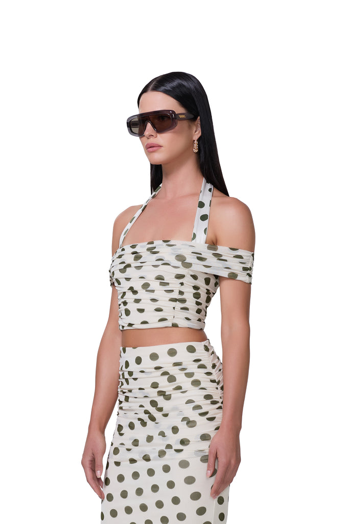 women's halter neck crop top with an off the shoulder neckline in birch dot print