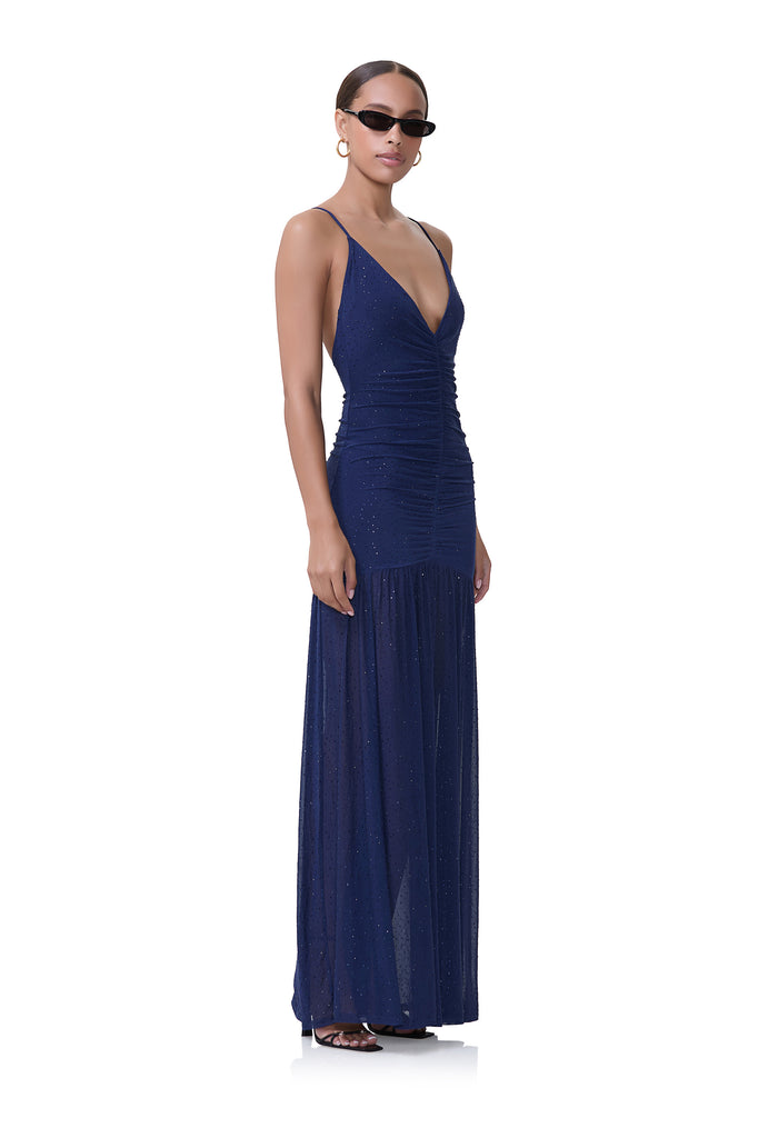 women's lowcut dress with drop waist, rouching on the body, and wide sweep and rhinestone details in bright navy