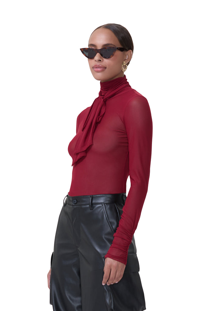 women's sheer long sleeve top with adjustable self neck tie and ruched sleeves in rhubarb