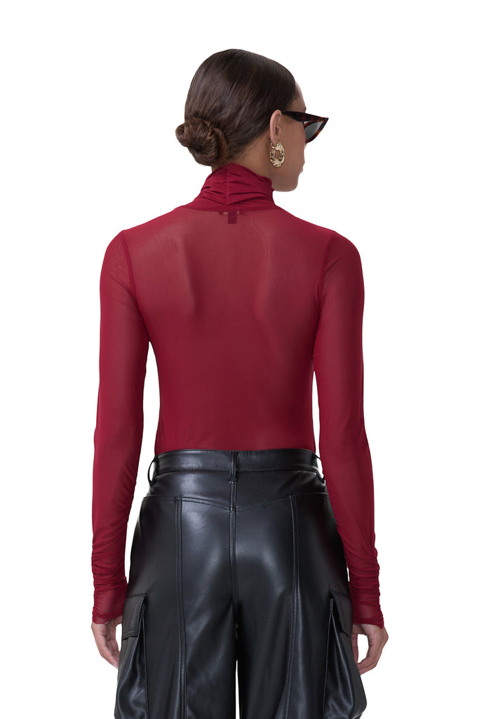 women's sheer long sleeve top with adjustable self neck tie and ruched sleeves in rhubarb